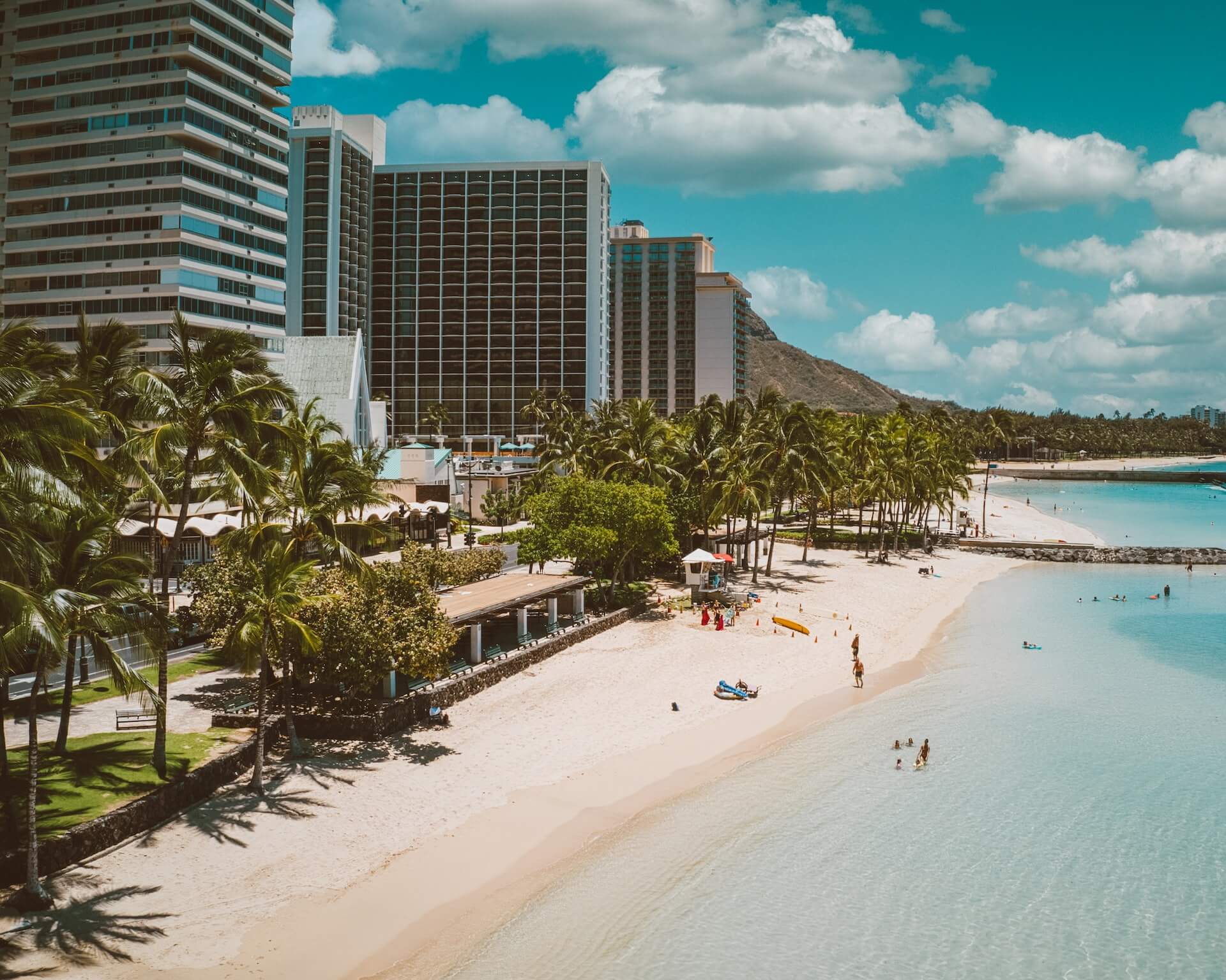Golden Beach in Honolulu, HI with hotels in background.