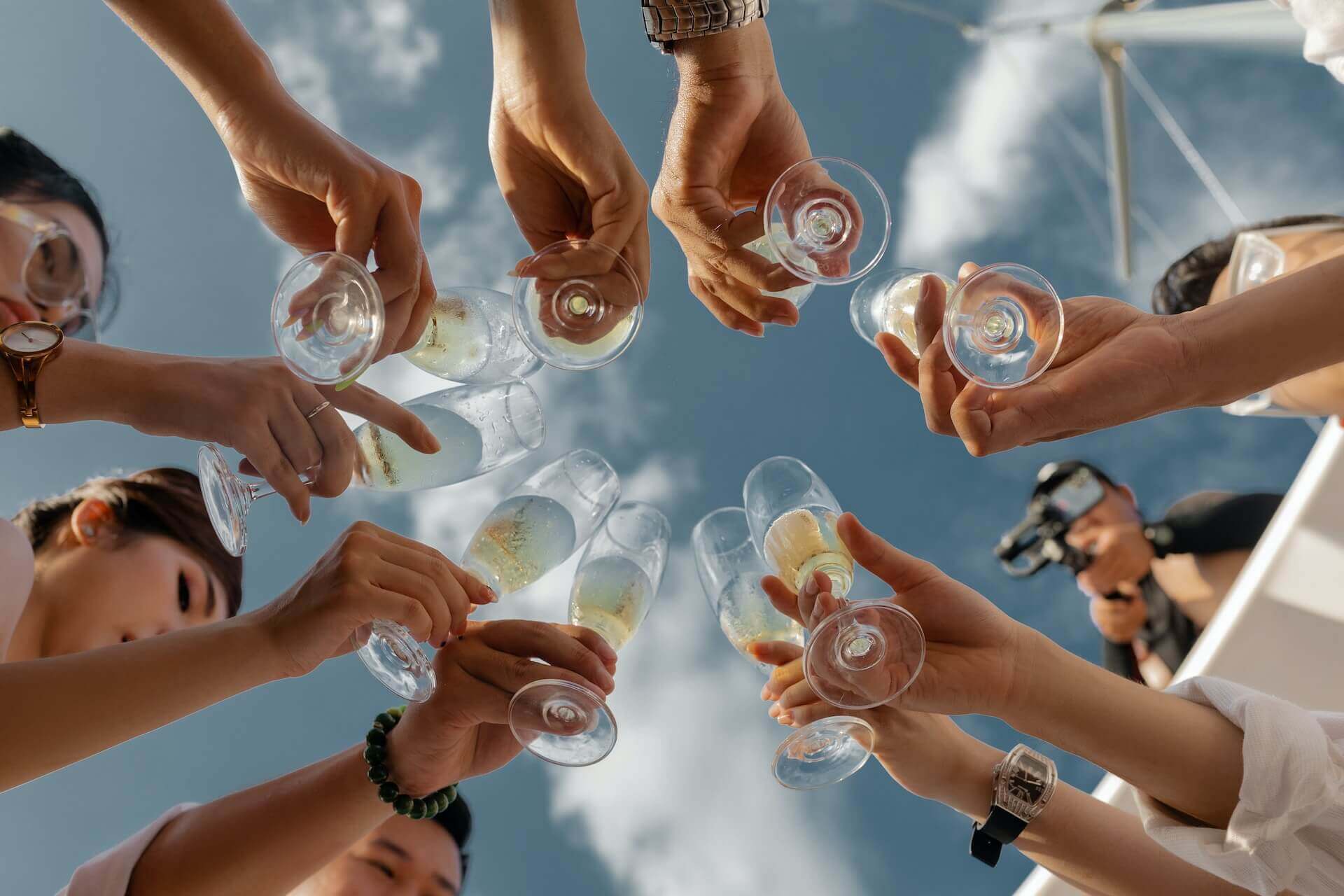 Group of women toasting with champagne.